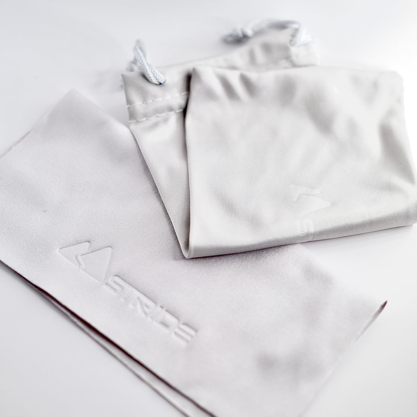 grey microfibre wiping cloth and pouch for sunglasses