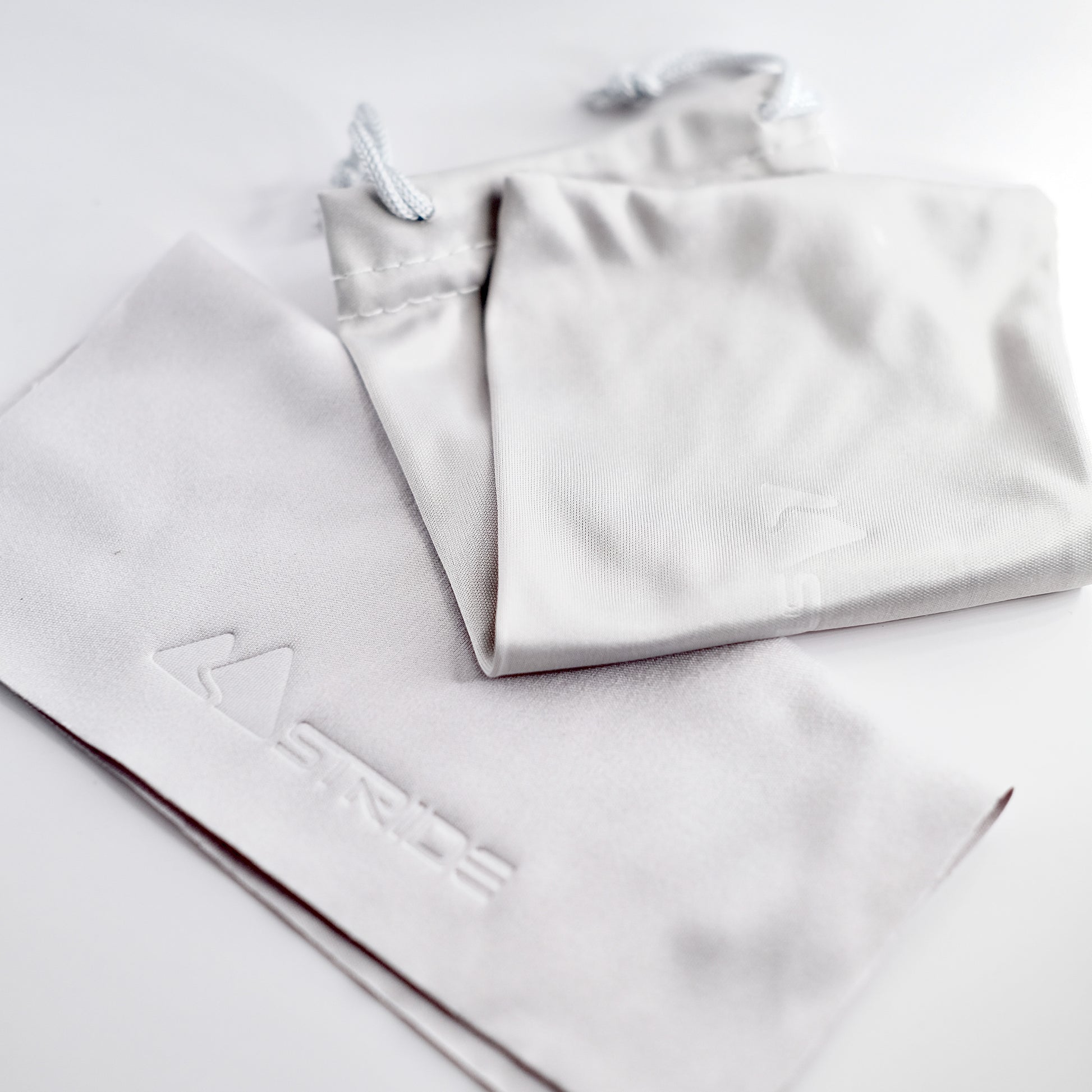 grey microfibre wiping cloth and pouch for sunglasses